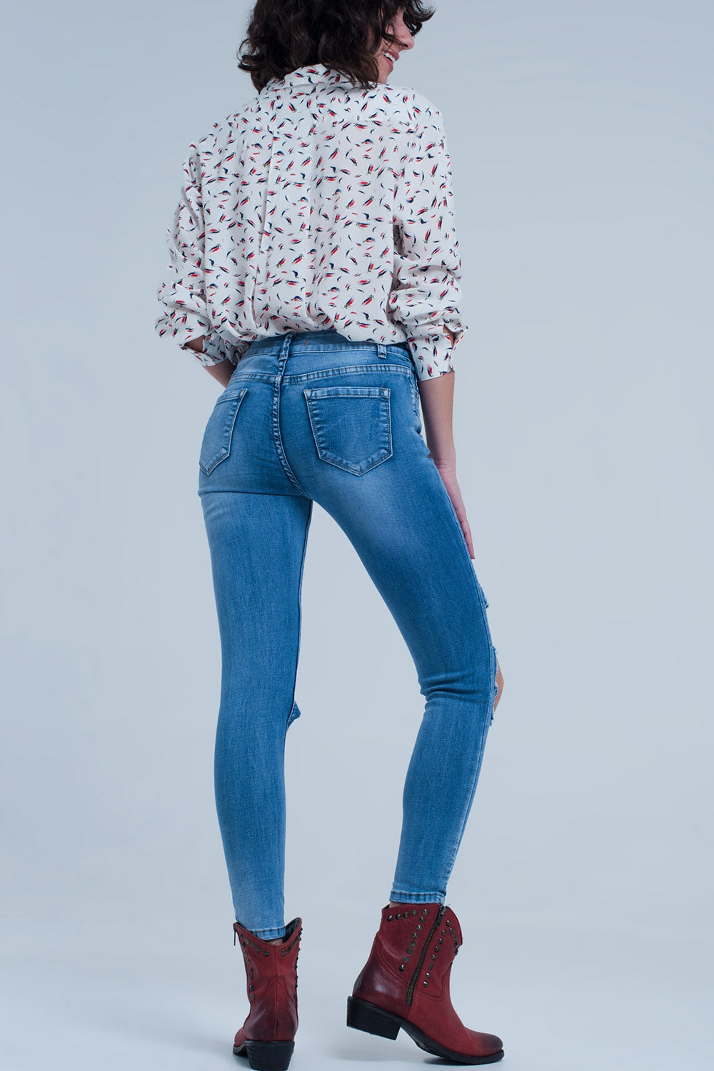 Light ripped skinny jeans in blue