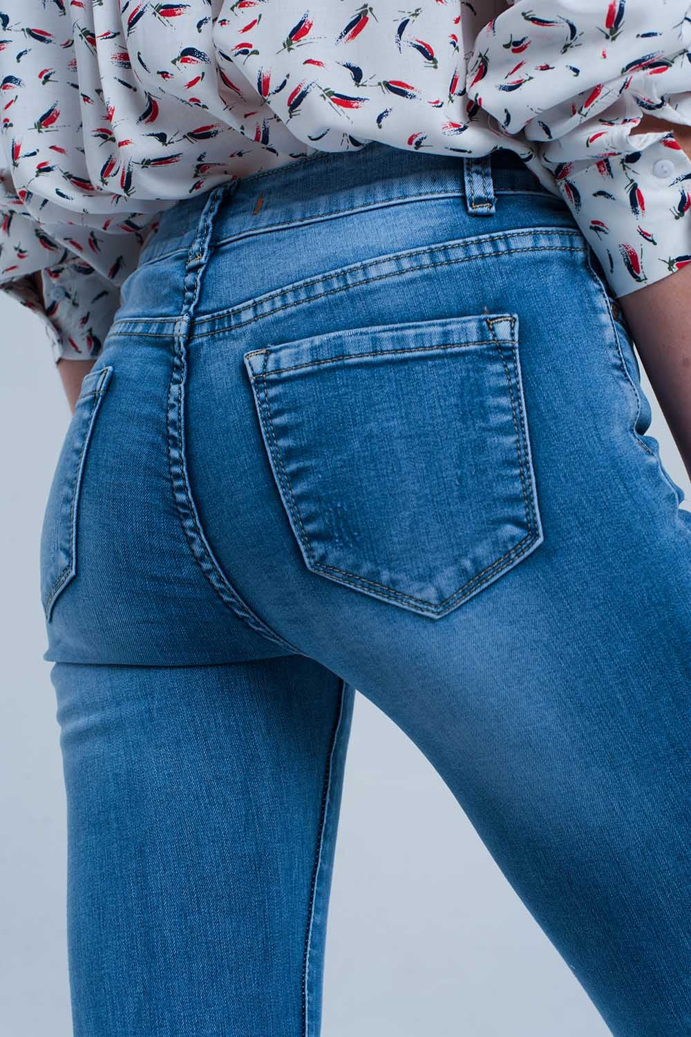 Light ripped skinny jeans in blue