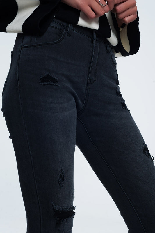 Distressed skinny jeans in black - Denim