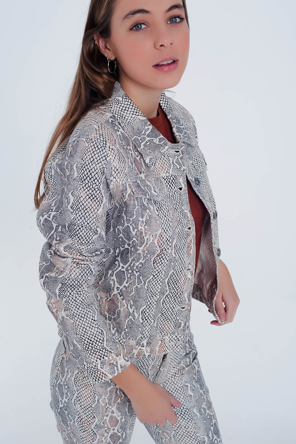 Beige jacket with snake print