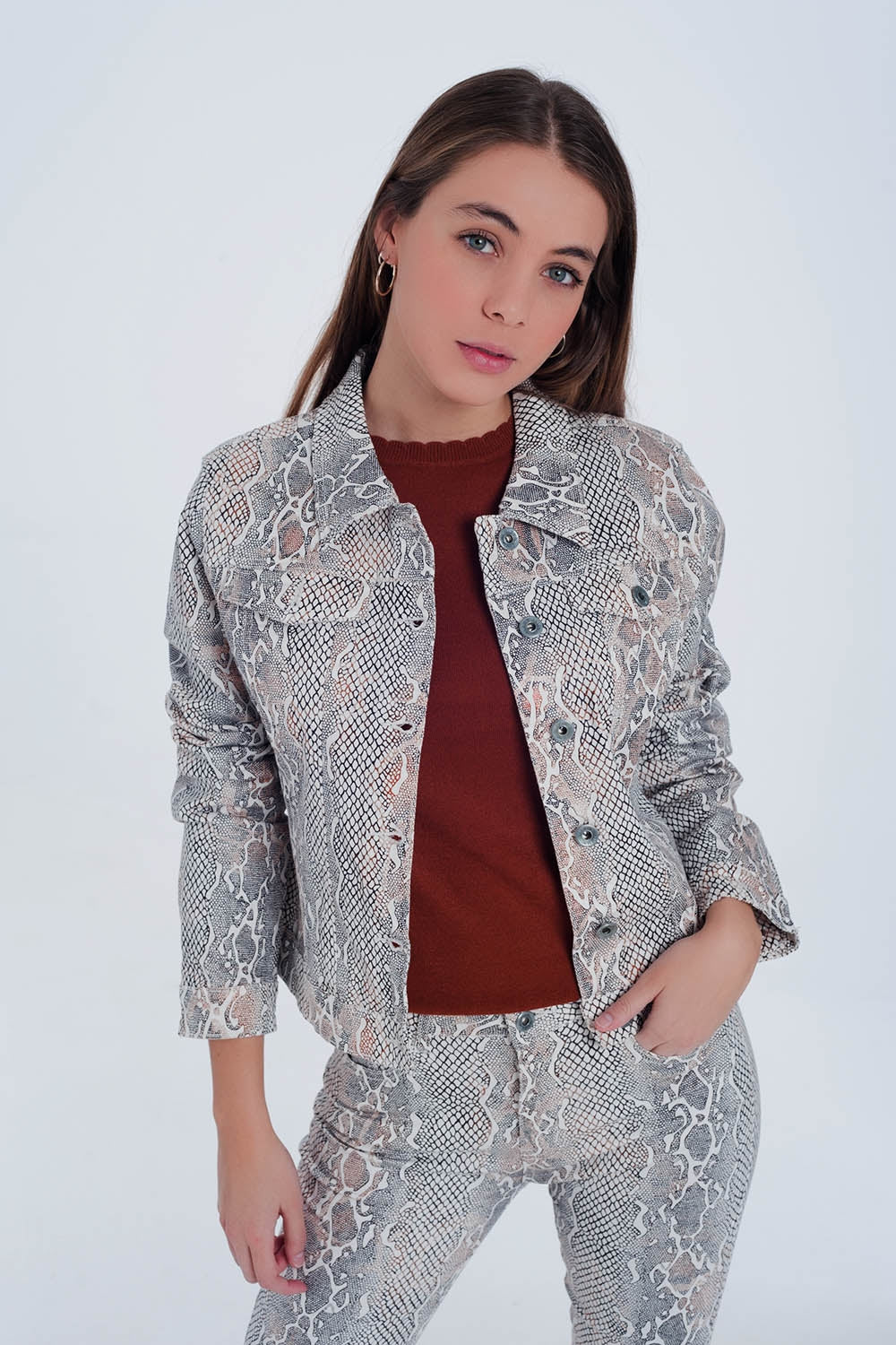 Beige jacket with snake print