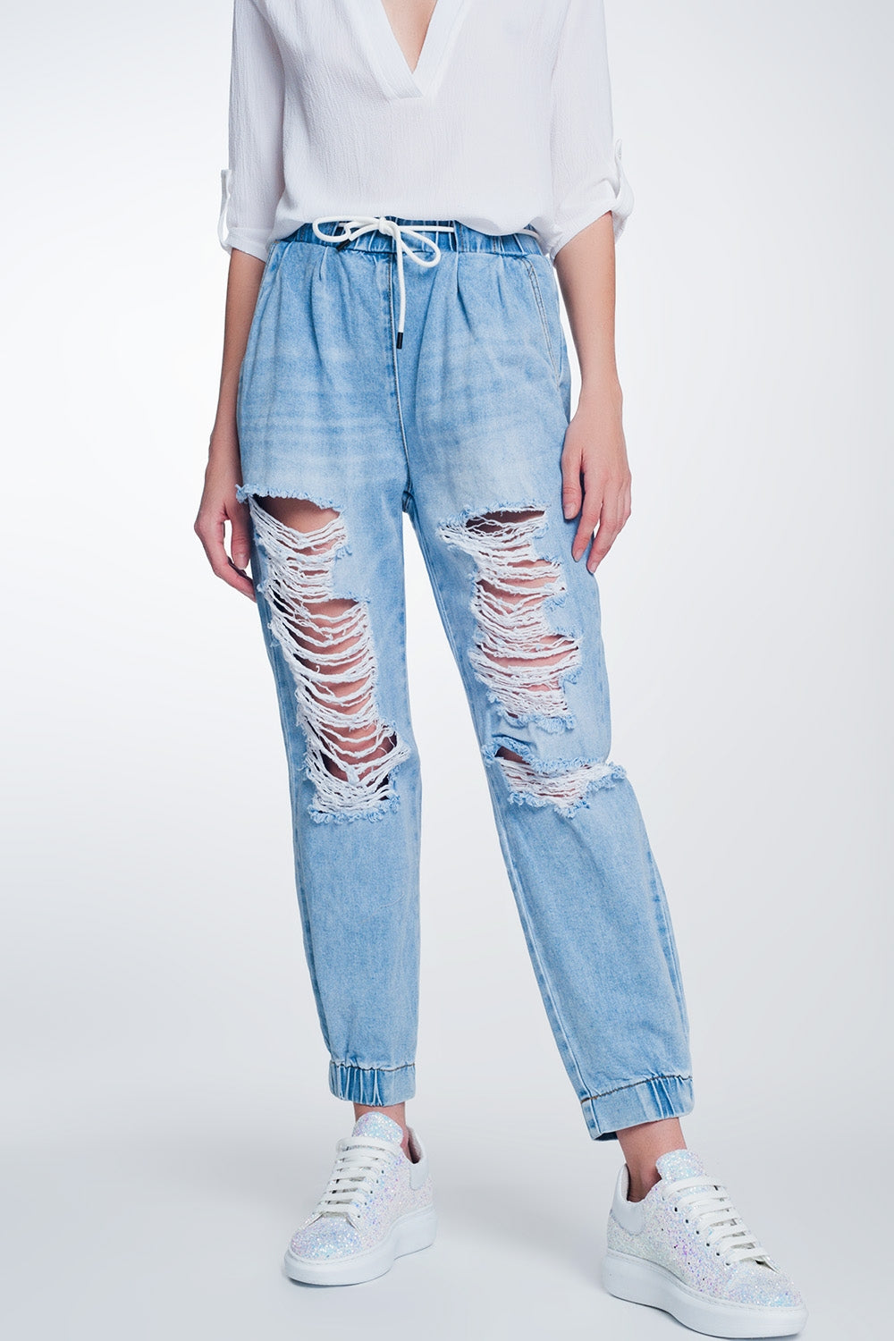Heavily ripped boyfriend jeans in light denim - Denim