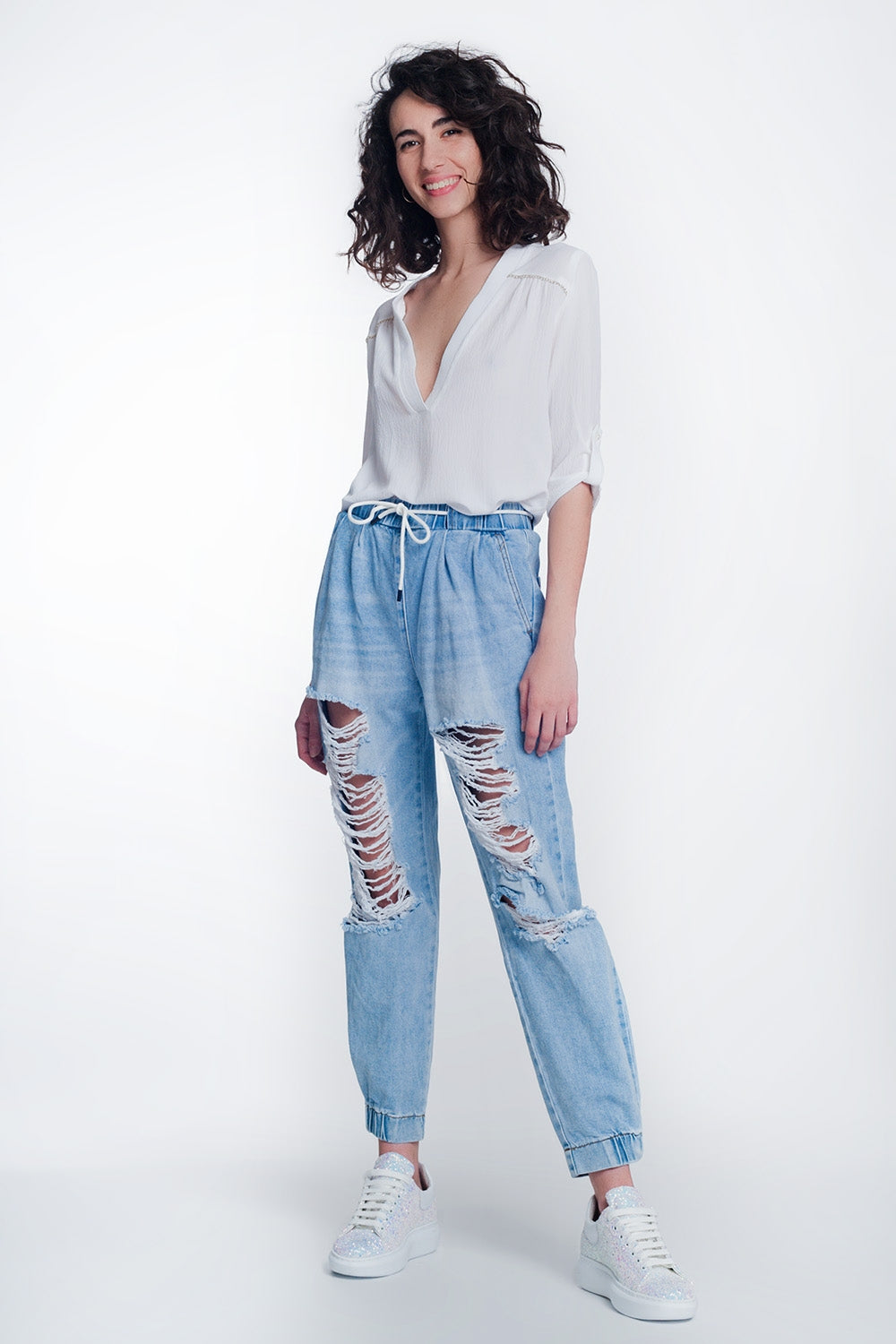 Heavily ripped boyfriend jeans in light denim - Denim