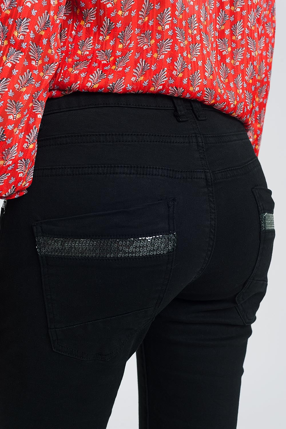 Black boyfriend pants with sequin pocket detail