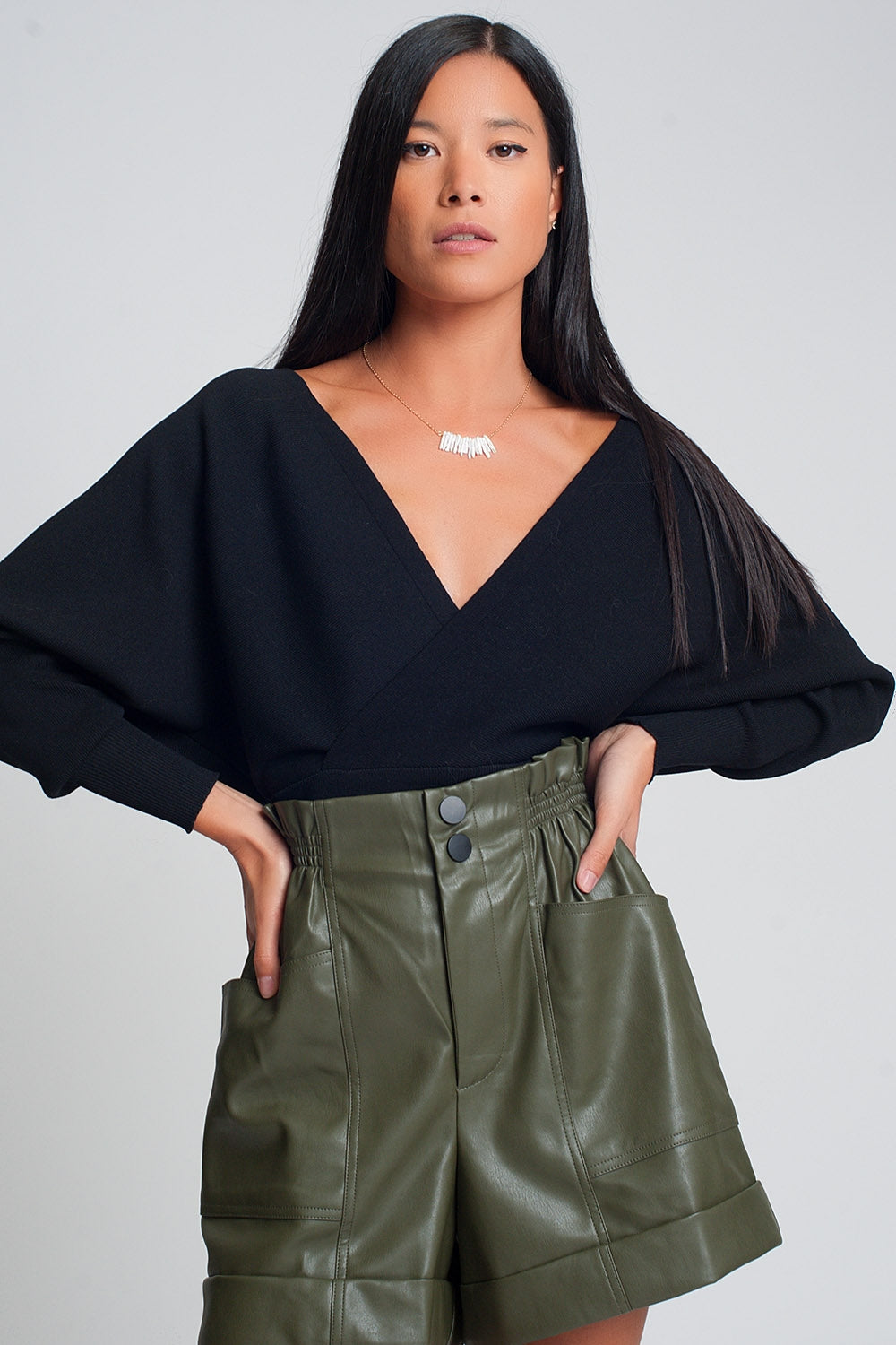 Knitted sweater with wrapped V-neck in black