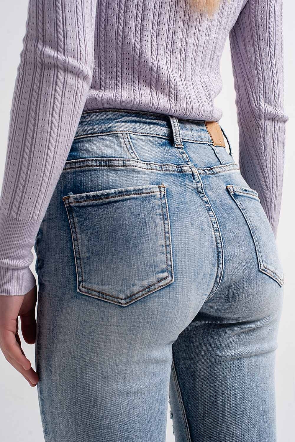 Heather skinny leg distressed jeans with button detail in light blue - Denim