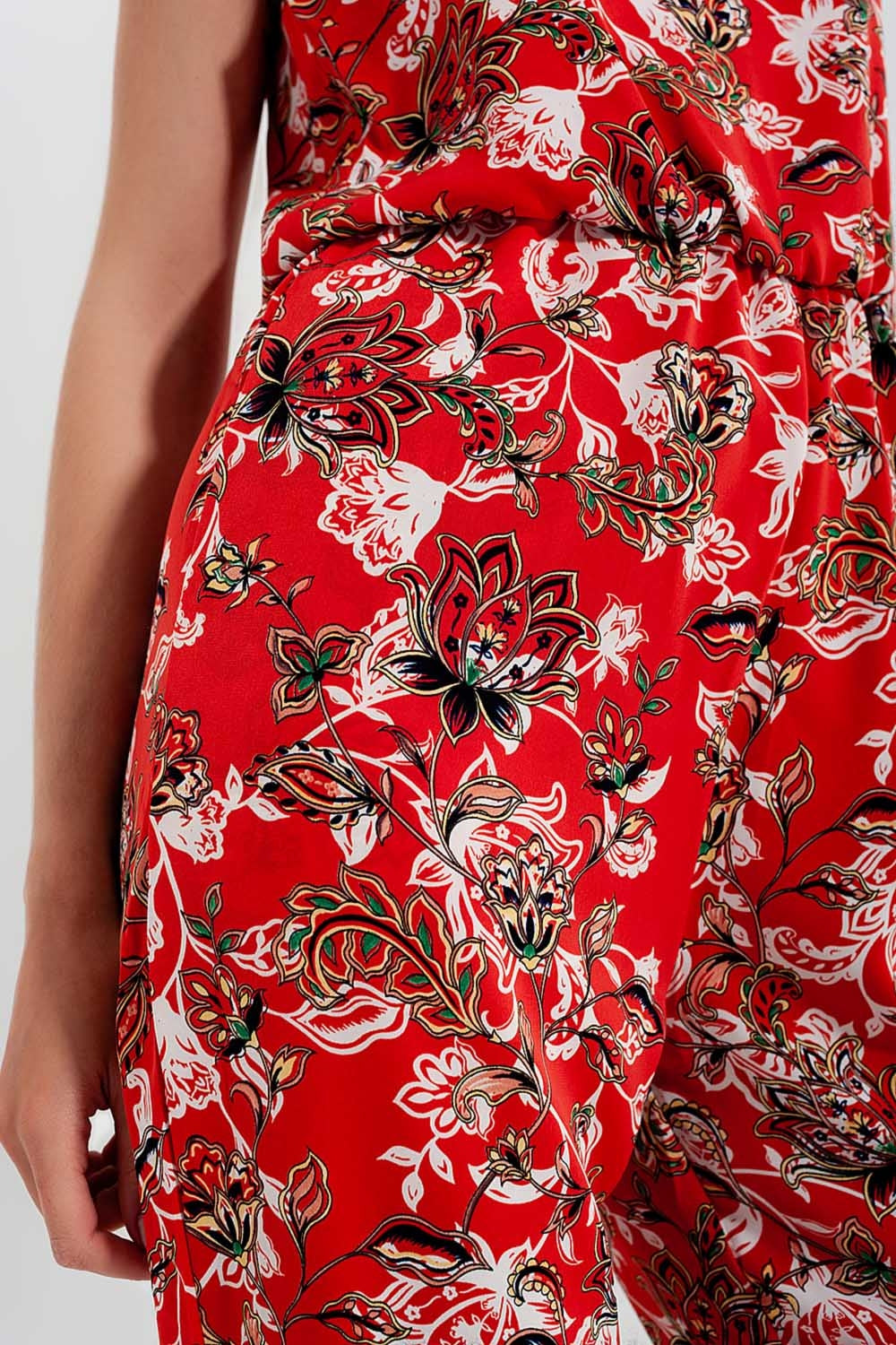 Cami strap jumpsuit in red floral print