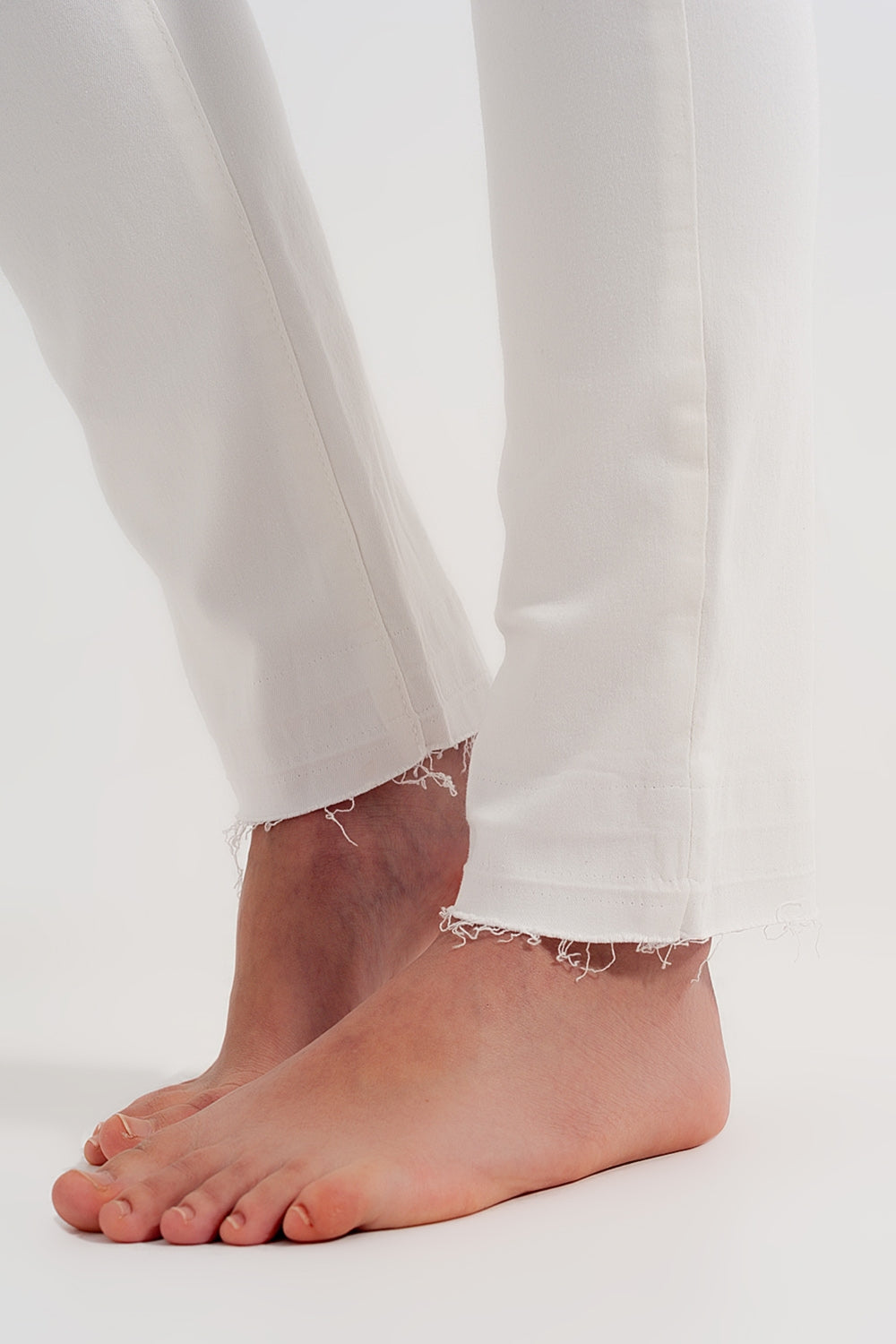 Ripped fray hem jeans in cream - Coloured Jeans