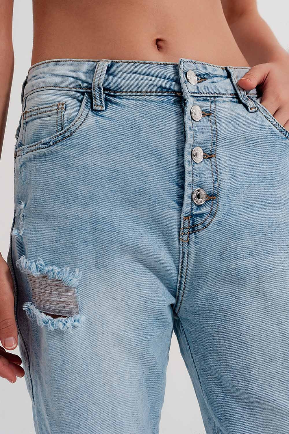 Straight leg distressed jeans with button detail in light blue - Denim