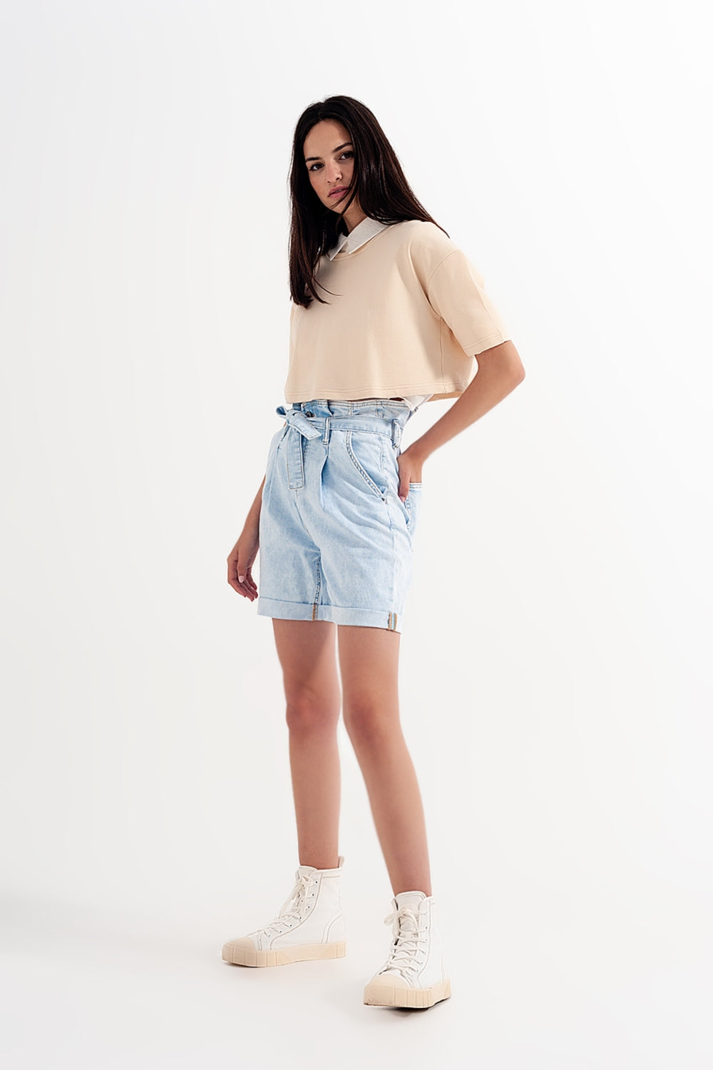 Denim shorts with light blue wash and waist tie