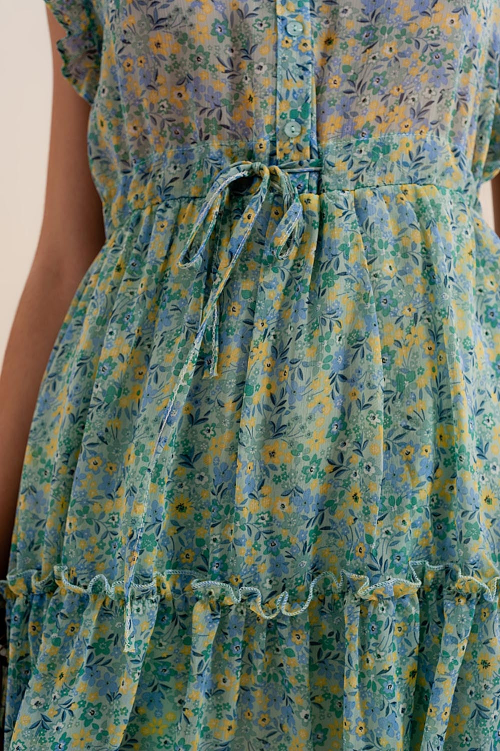 Mini dress with ruffle trims in vintage floral in green - dress
