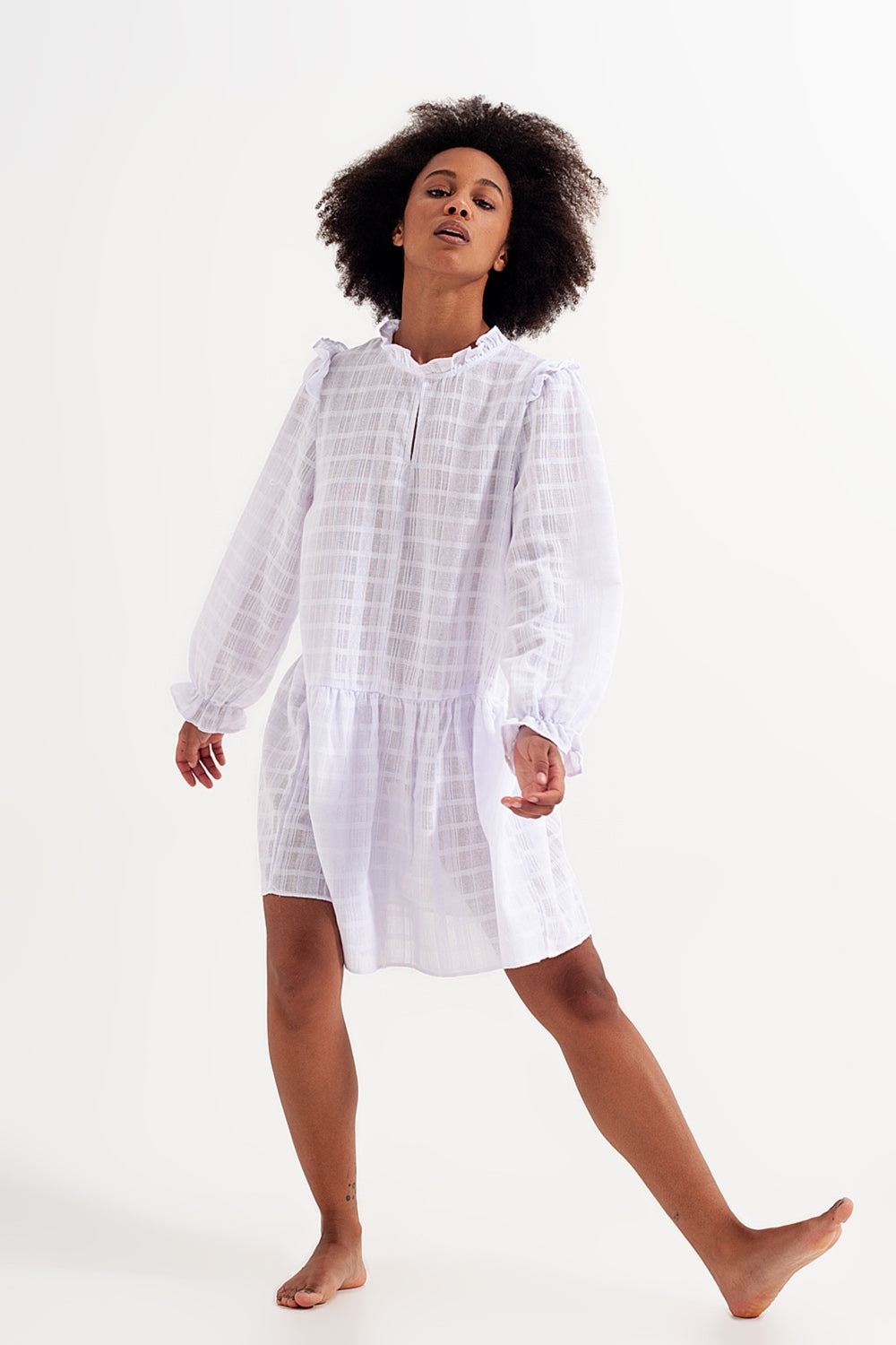 Voluminous mini dress with ruffles in white - dress