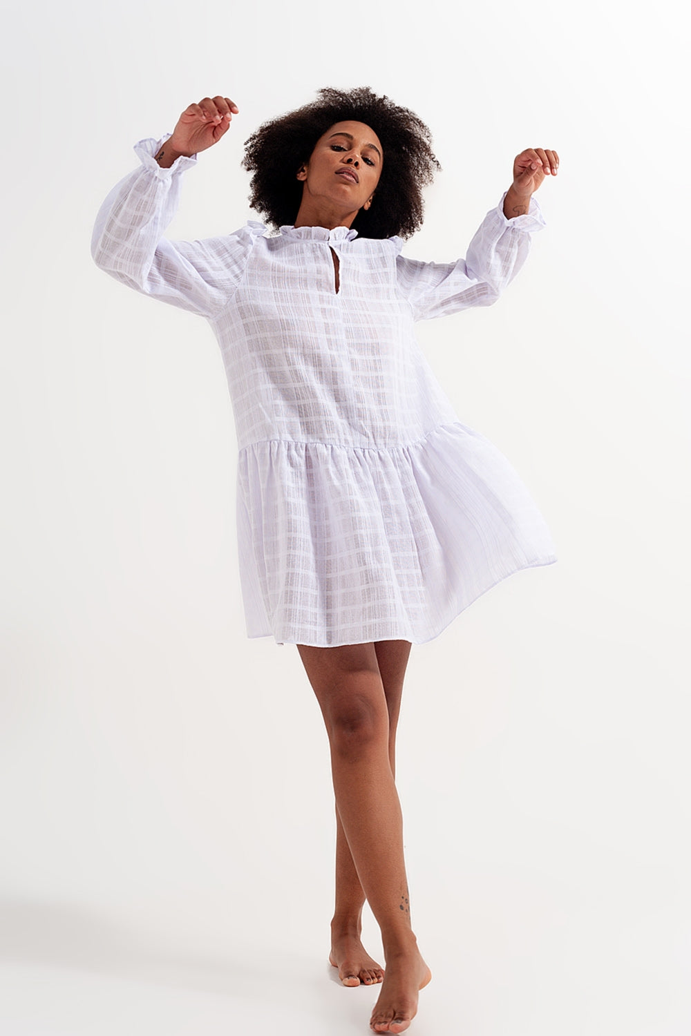 Voluminous mini dress with ruffles in white - dress