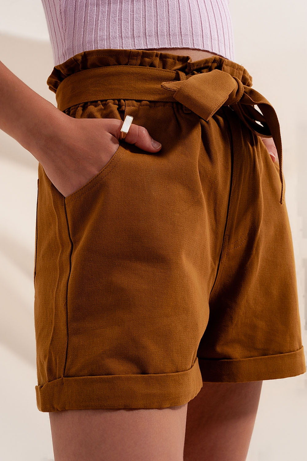Shorts with belted waist in camel - trousers