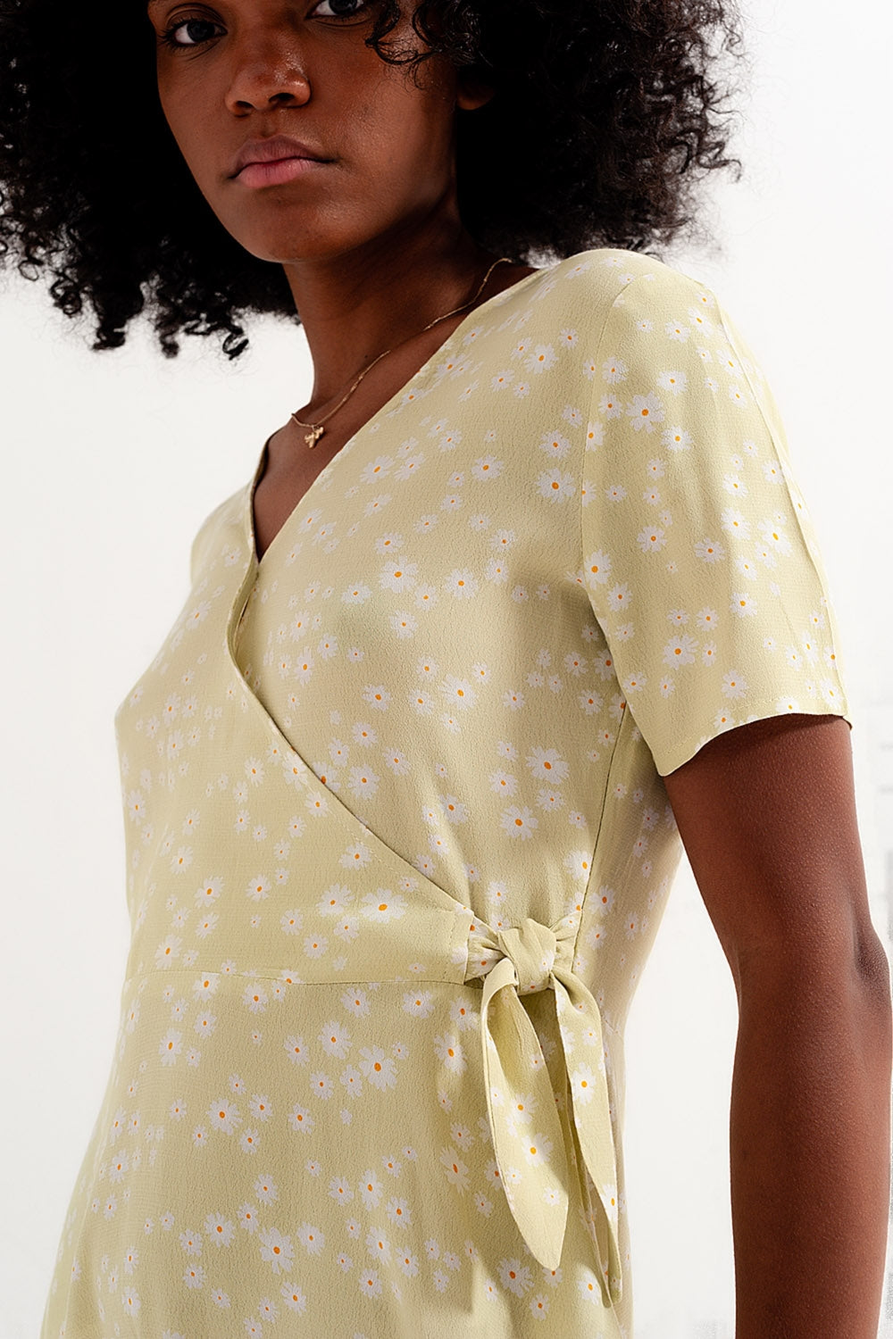 Mini wrap dress in daisy print in green - dress