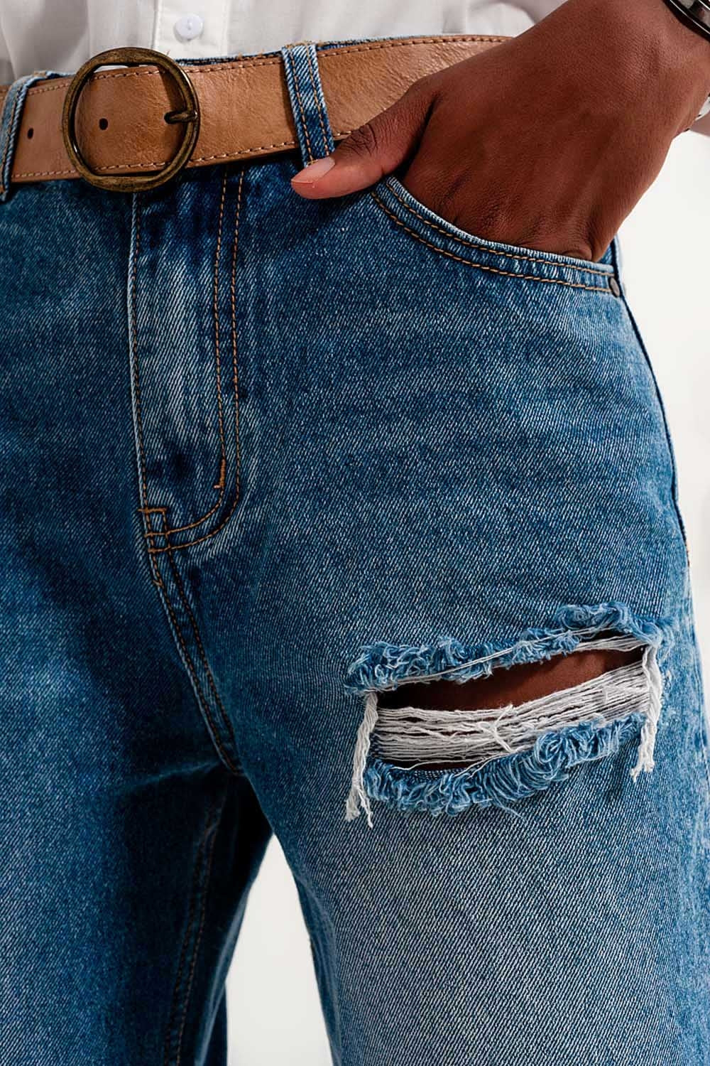 High rise slim mom jeans in midwash with rips
