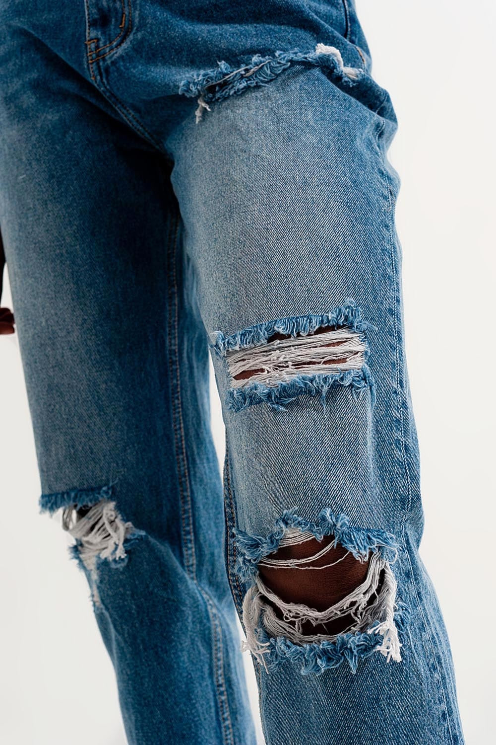 High rise slim mom jeans in midwash with rips