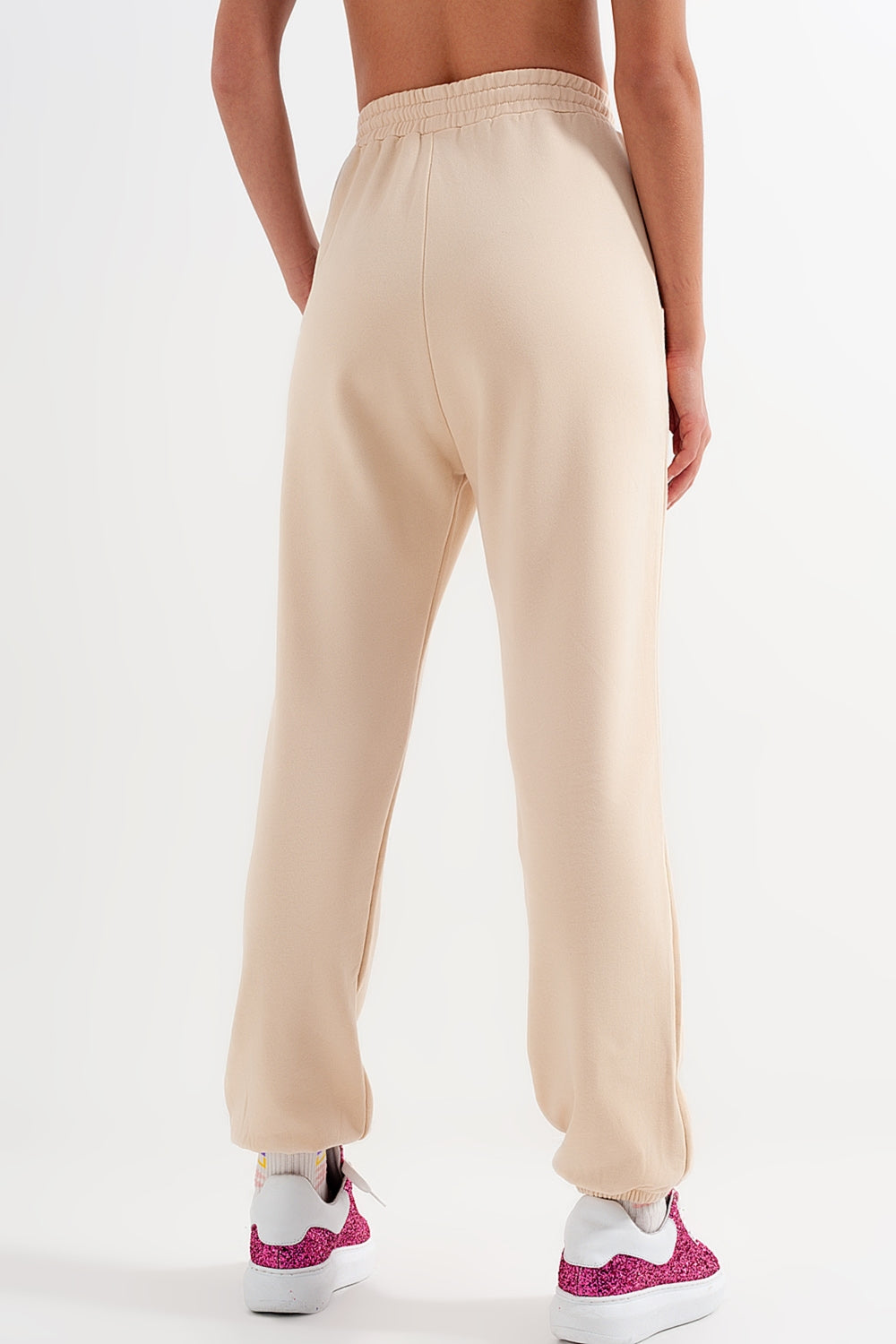 Joggers with elastic waist band in beige - trousers