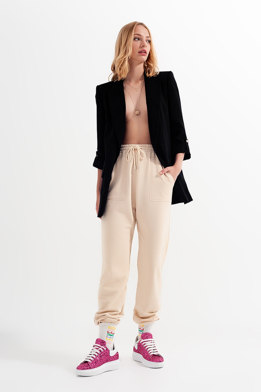 Joggers with elastic waist band in beige - trousers