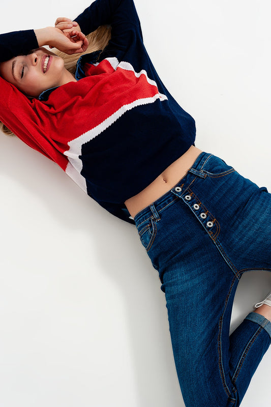 High rise jeans with exposed buttons in blue - Denim