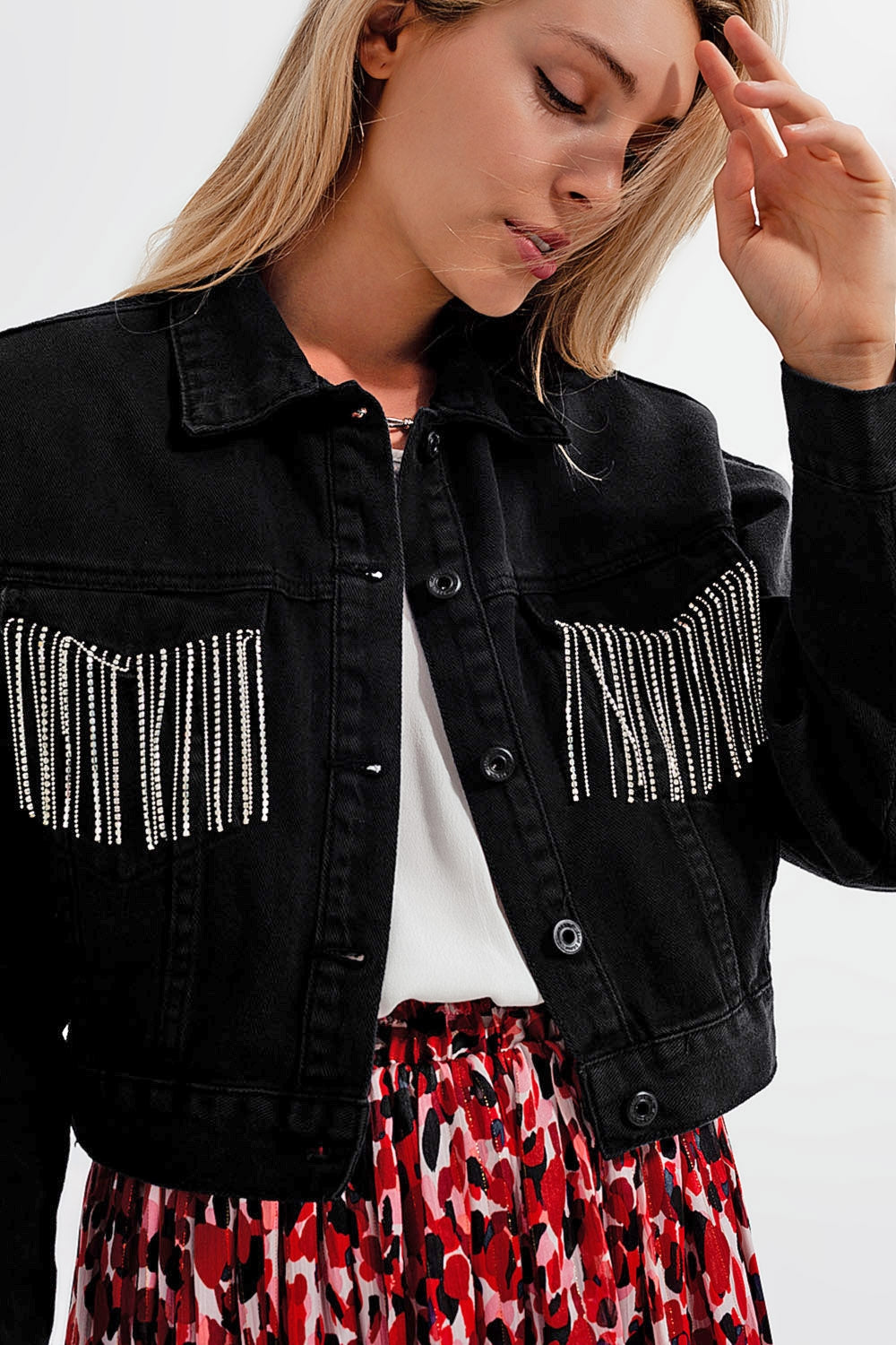 Black denim jacket with strass fringing
