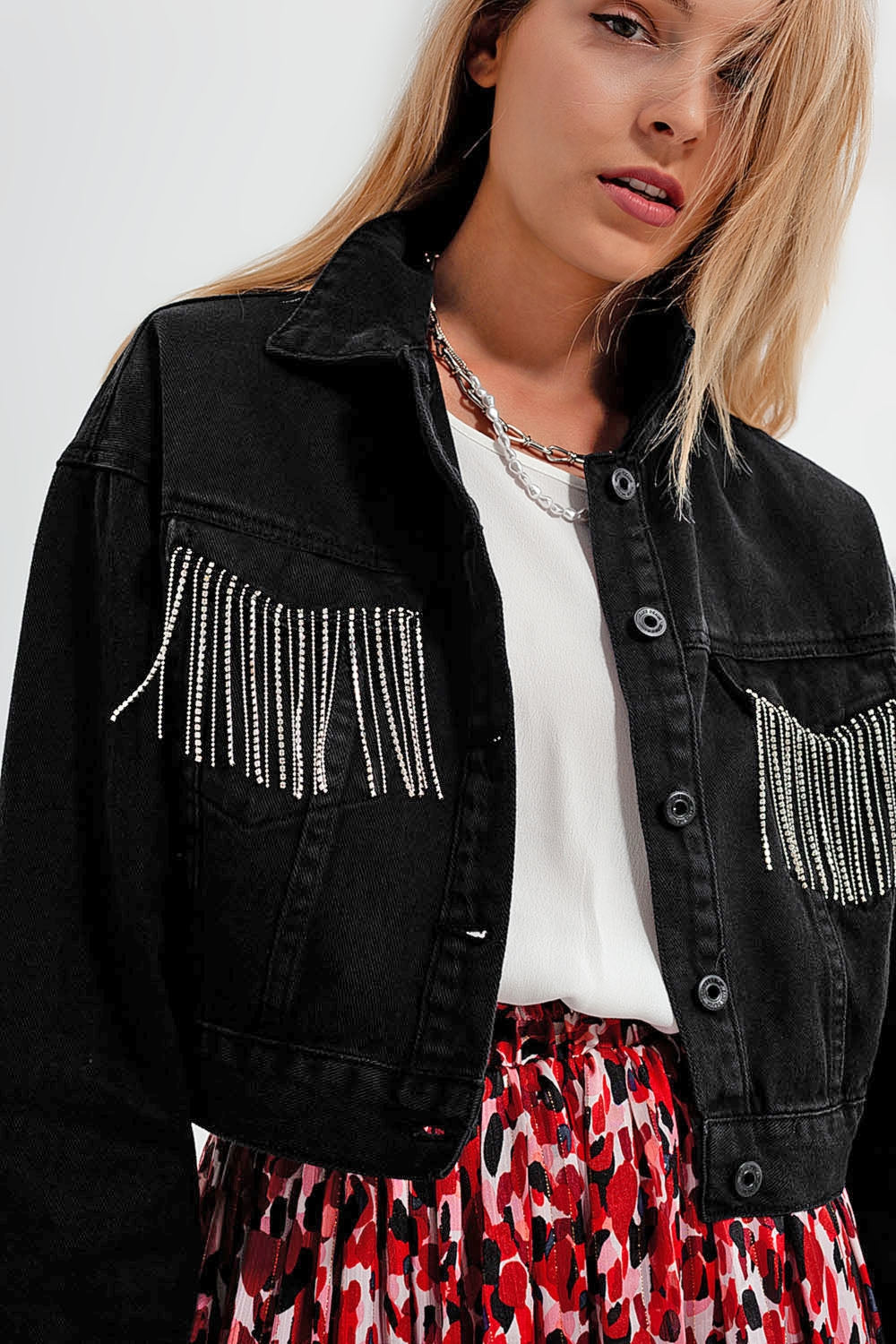 Black denim jacket with strass fringing
