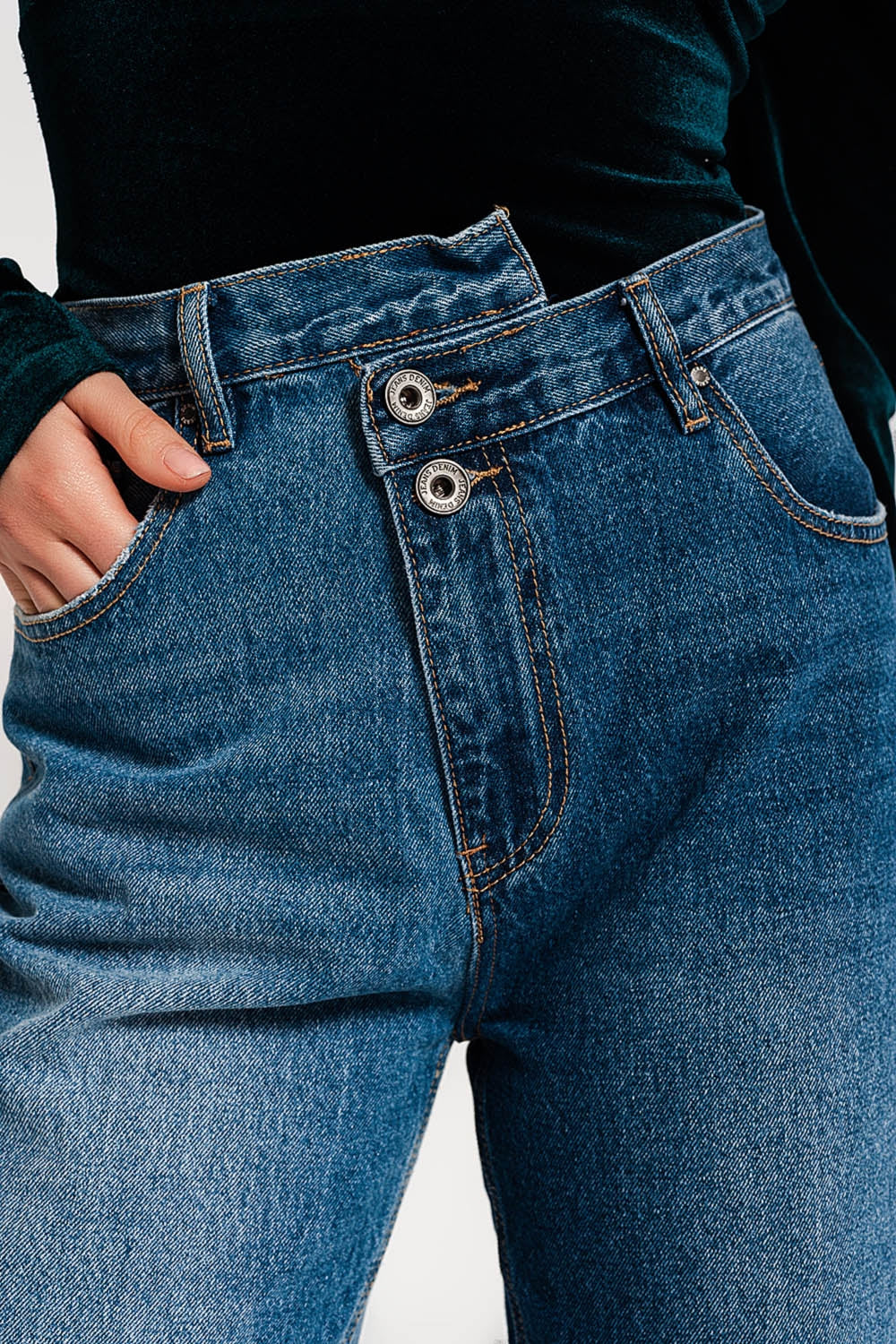 Asymmetric button detail straight jeans in mid blue