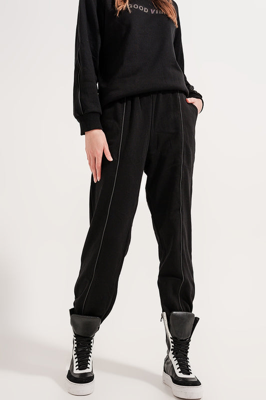 Joggers with drawstring waist and front seam in black - trousers