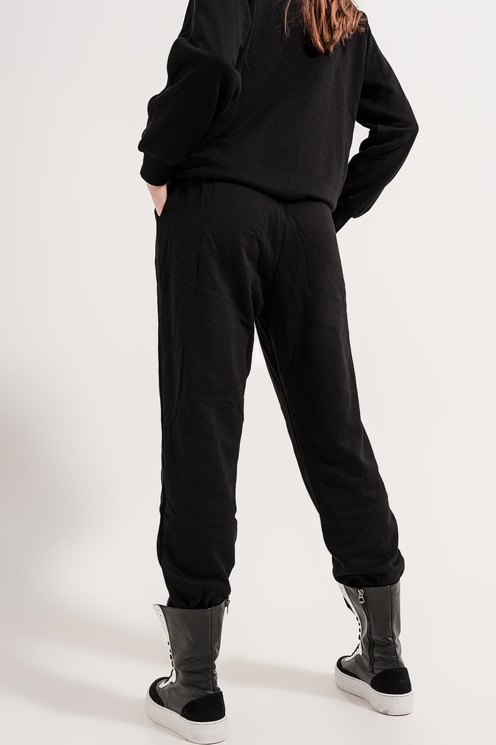 Joggers with drawstring waist and front seam in black - trousers