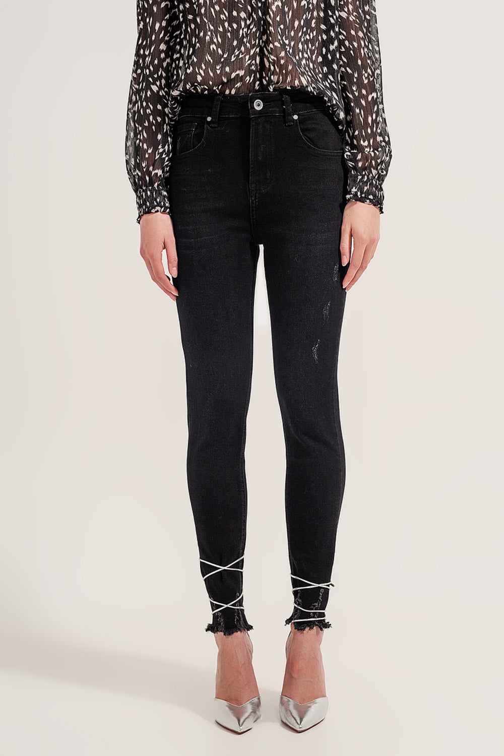 Jean skinny ourlet brut noir délavé