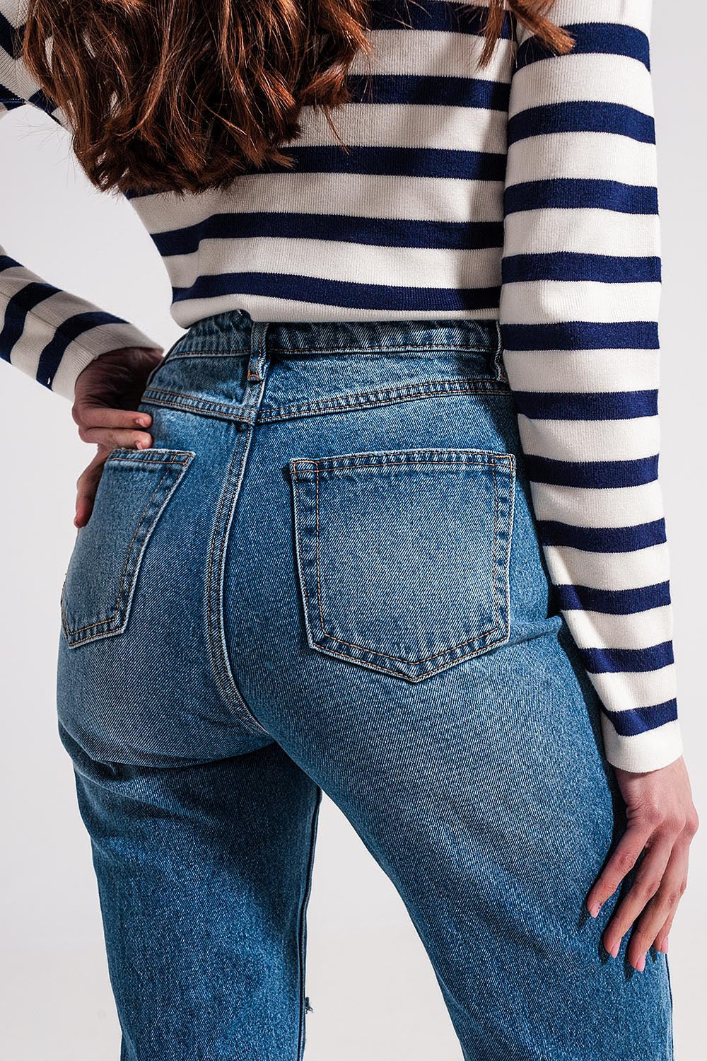 Asymmetric button detail jeans in mid blue - Denim