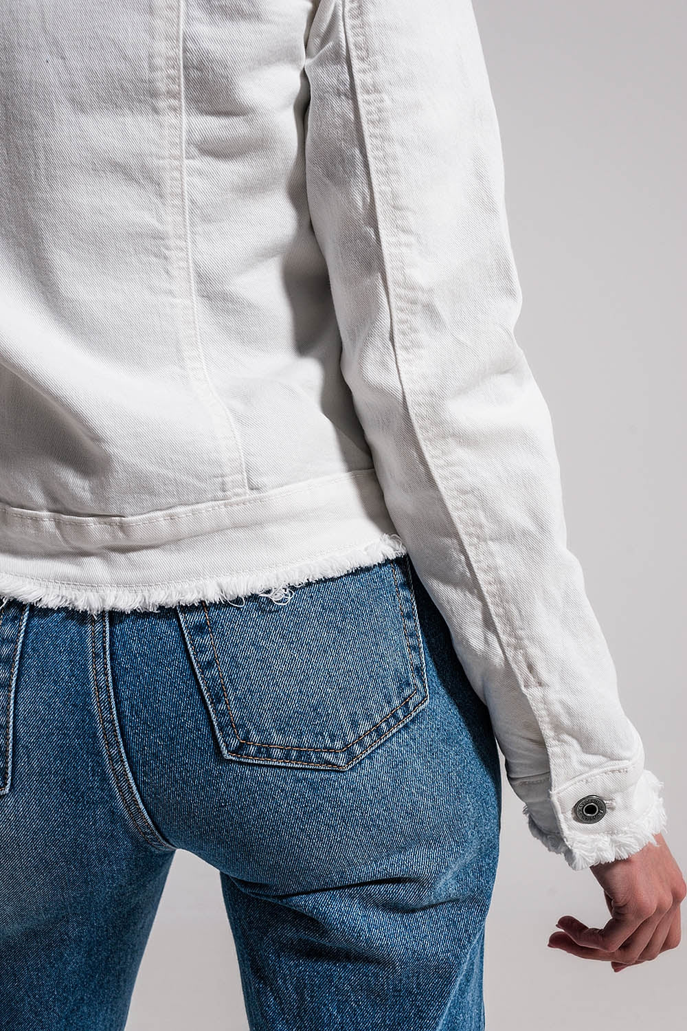 Raw edge denim jacket in white