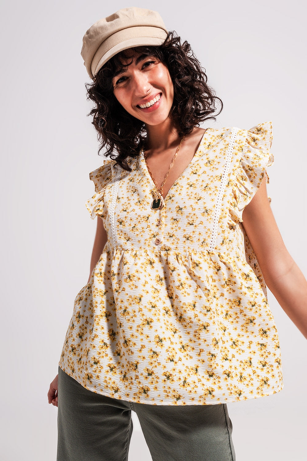 Ruffle detail blouse in yellow