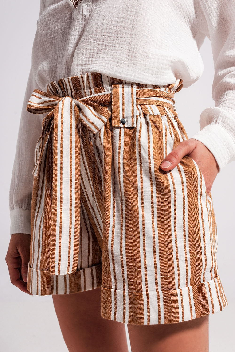 Shorts with paperbag waist in beige - trousers