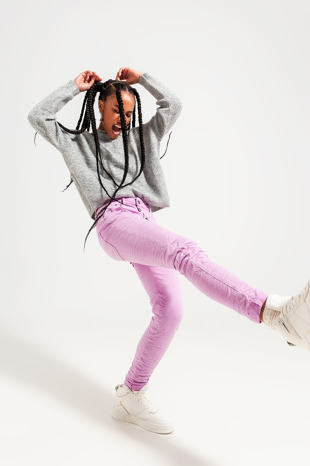 Exposed buttons skinny jeans in pink