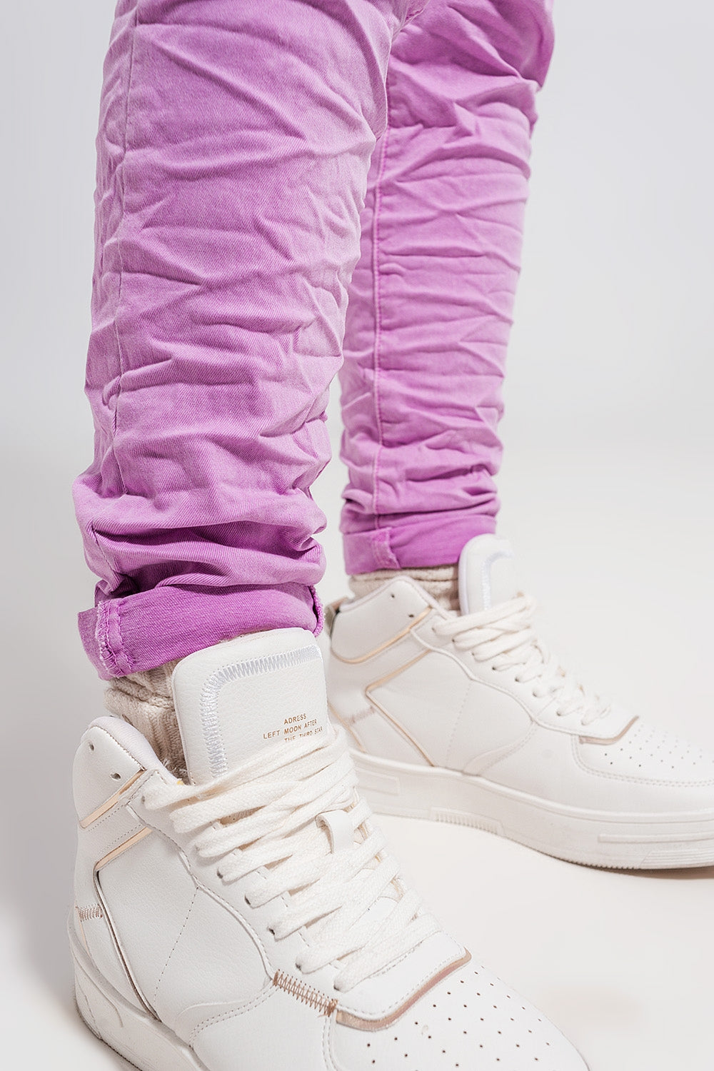 Exposed buttons skinny jeans in pink