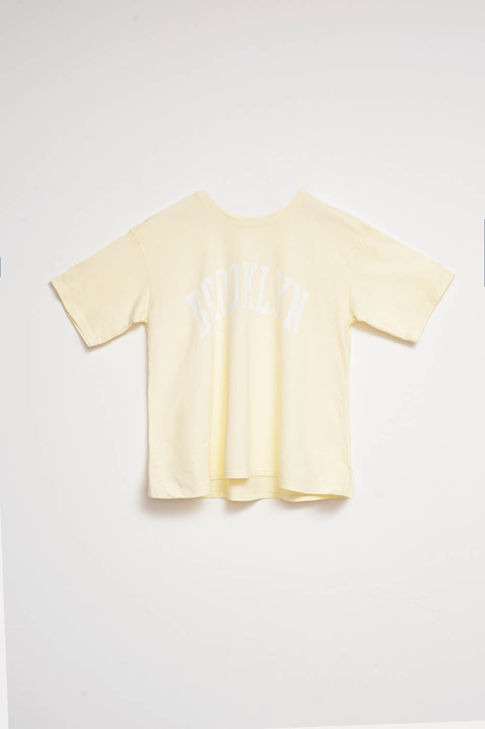 T-Shirt with Brooklyn District Text in yellow - top