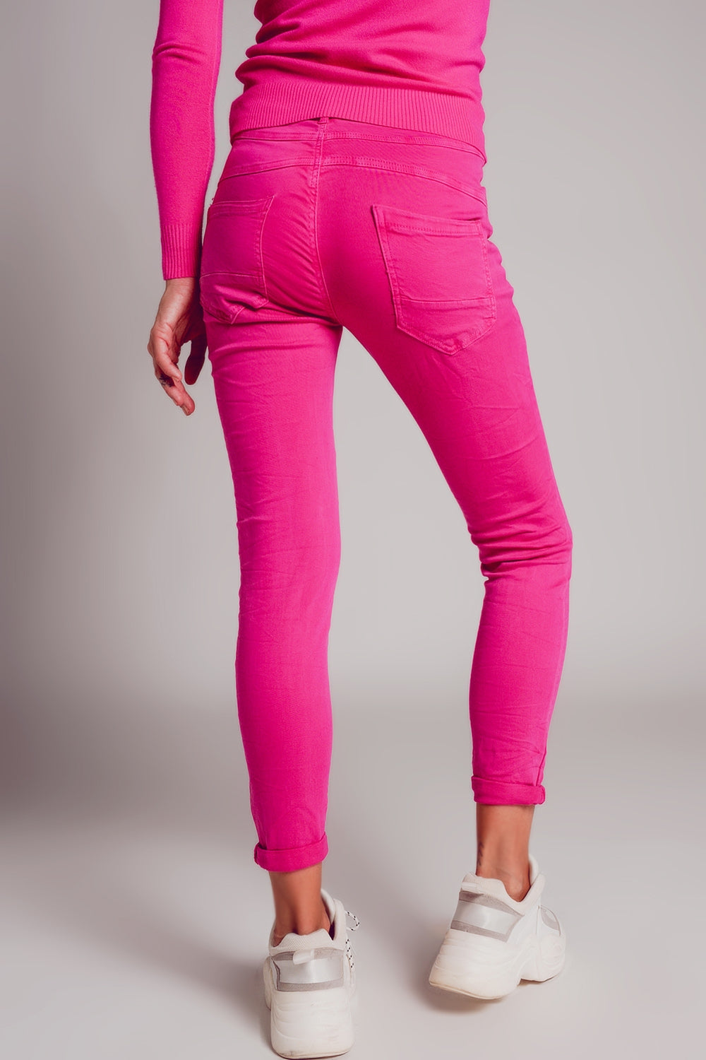Exposed buttons skinny jeans in fuchsia - Coloured Jeans