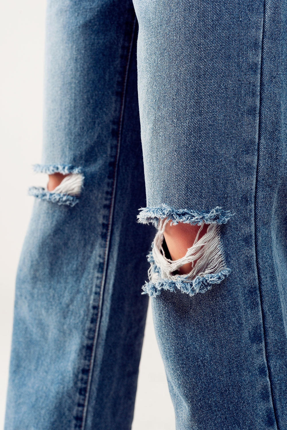 Distressed straight leg jean in medium denim - Denim