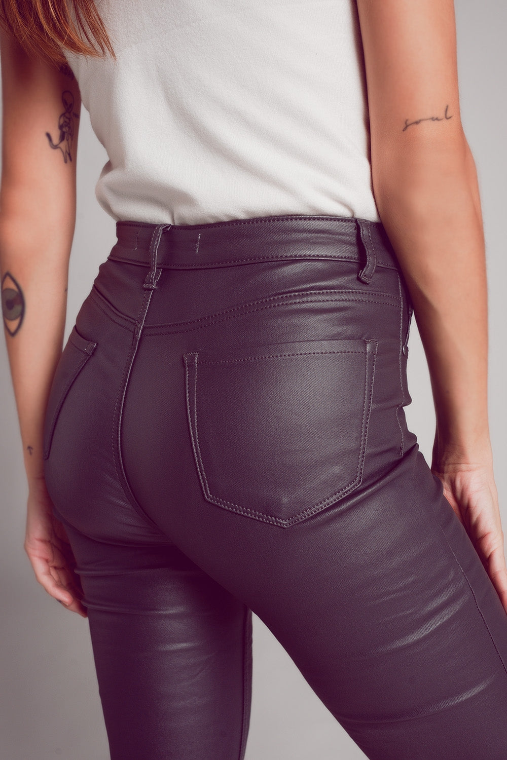 Stretch faux leather flare pants in grey - trousers