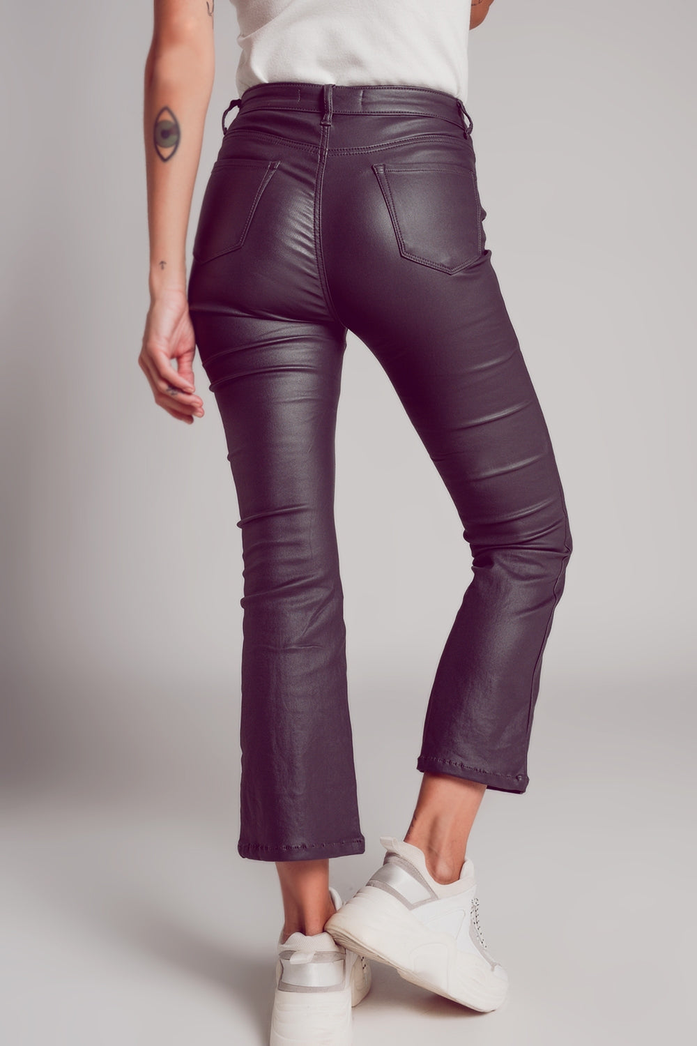 Stretch faux leather flare pants in grey - trousers