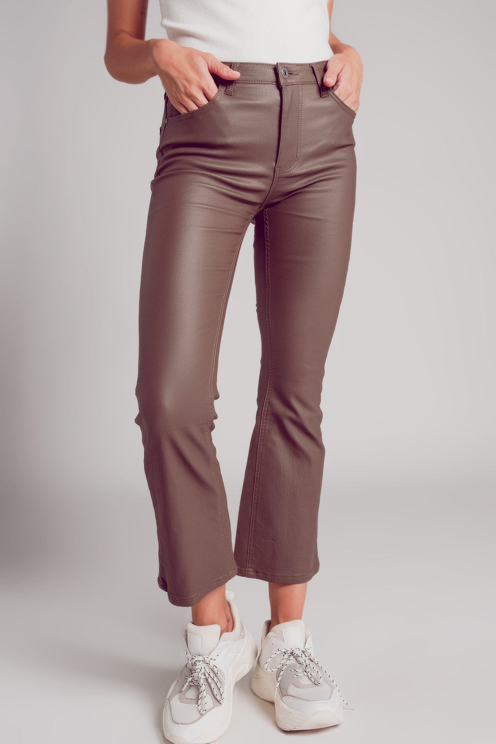 Stretch faux leather flare pants in beige - trousers