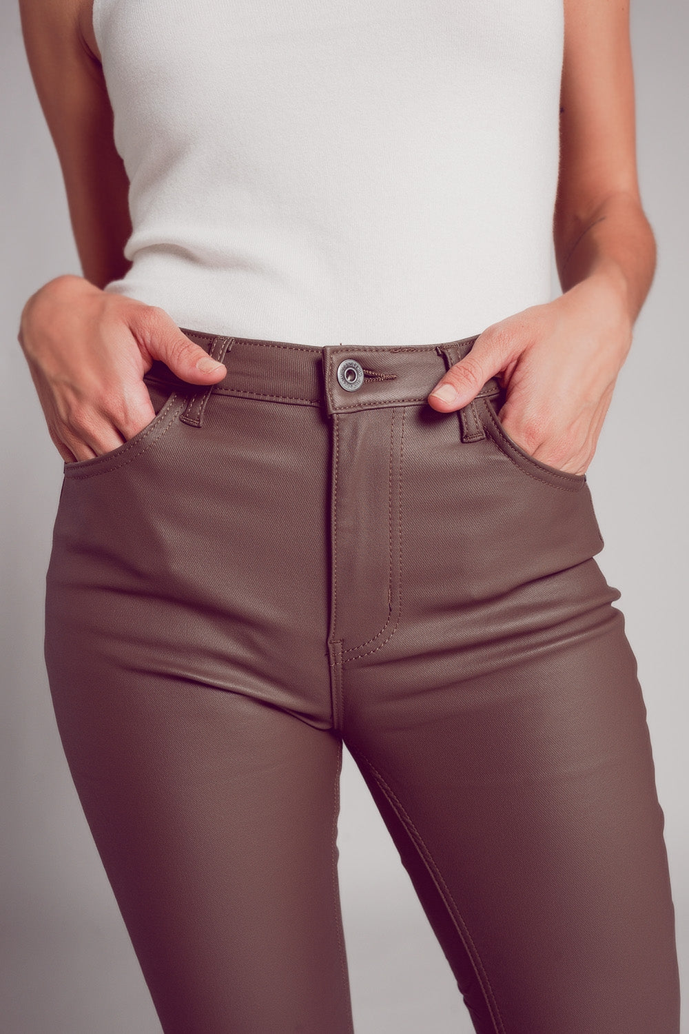 Stretch faux leather flare pants in beige - trousers