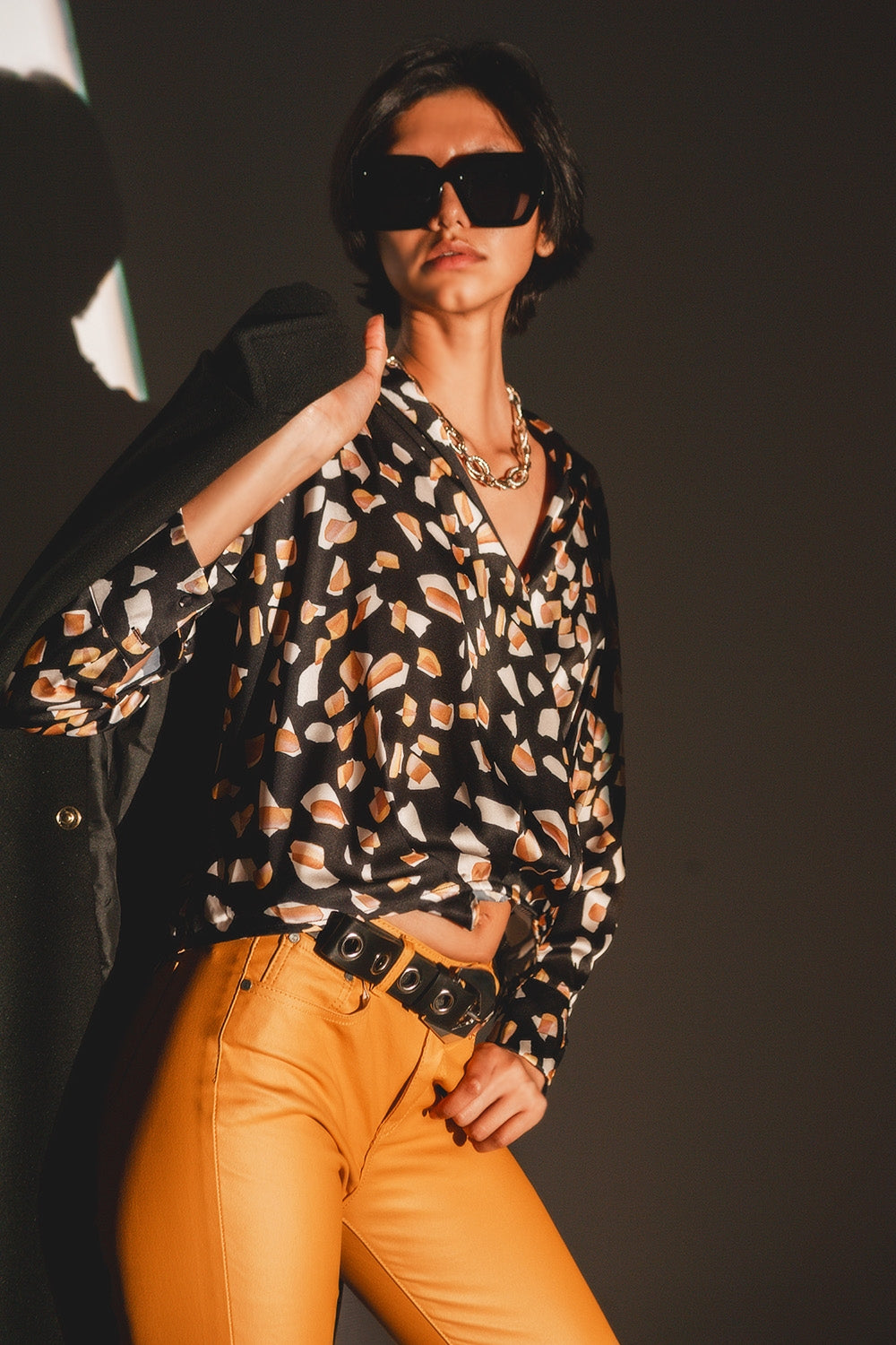 Black blouse with print and wrapped front