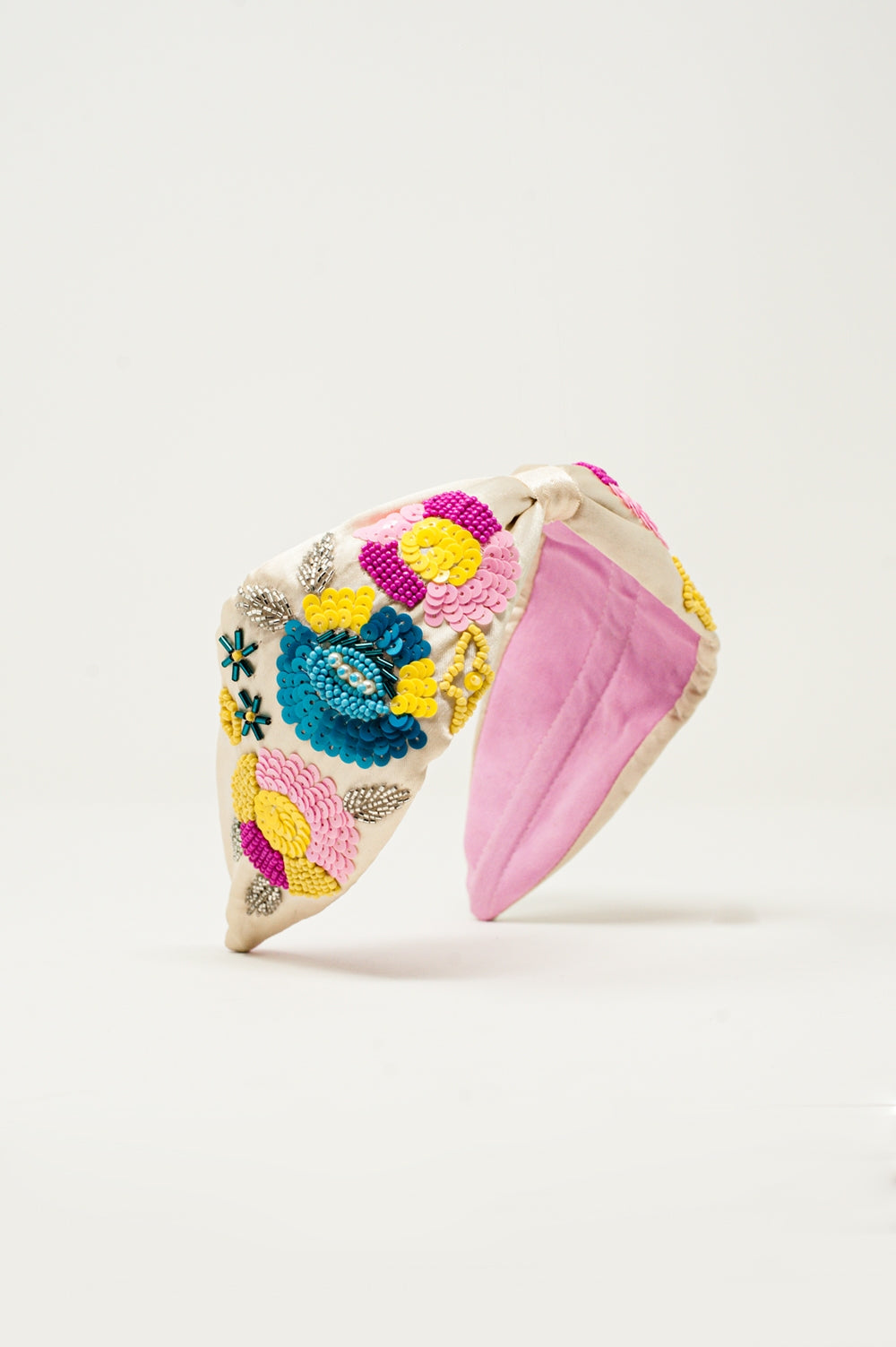 Knotted headband with embellished flowers in cream