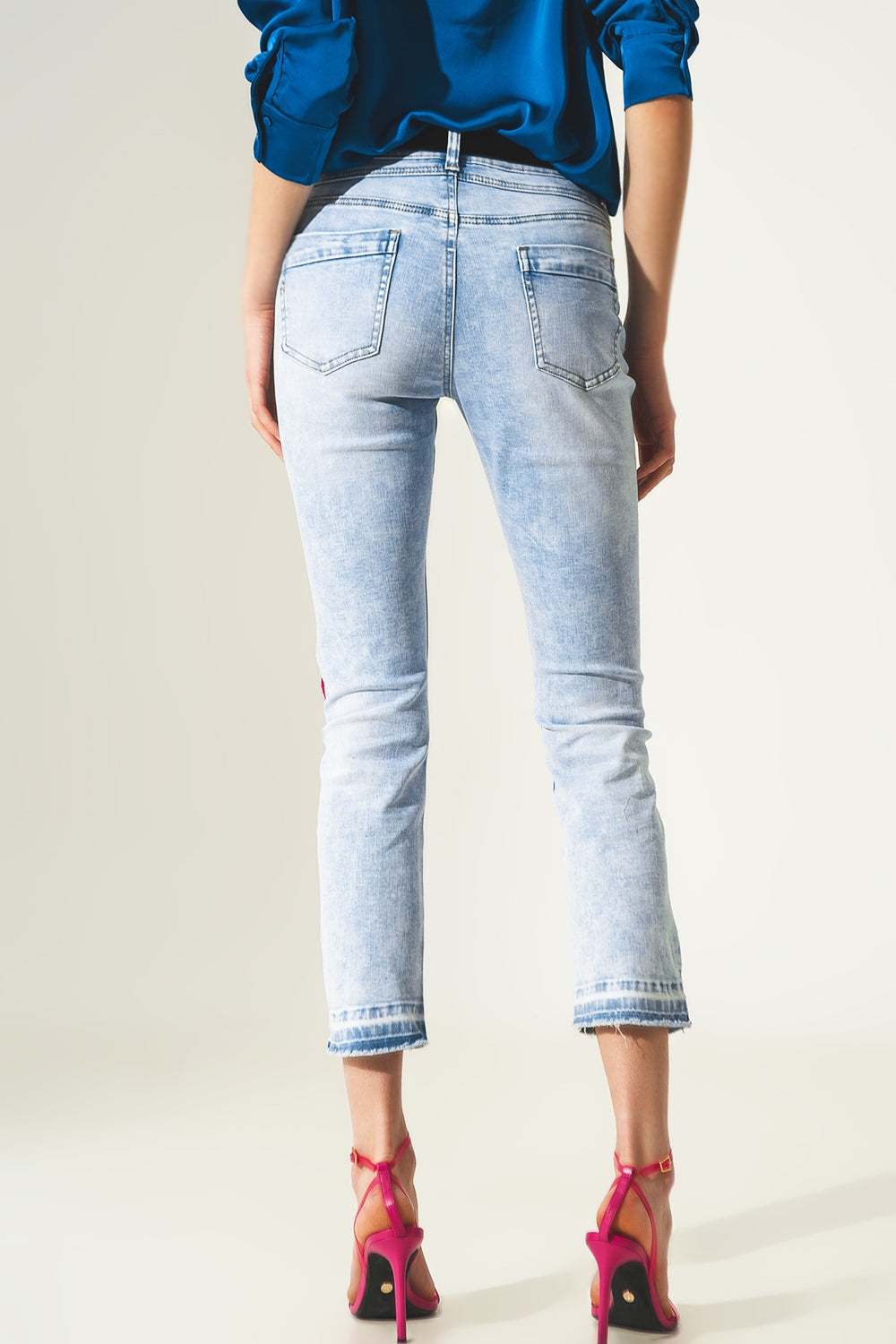 Distressed straight jeans with hem detail in blue - Denim