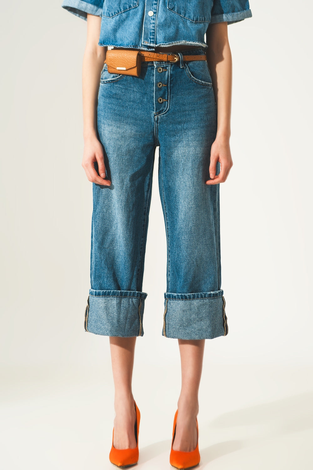 Relaxed jeans with rolled hem and exposed buttons in blue - Denim