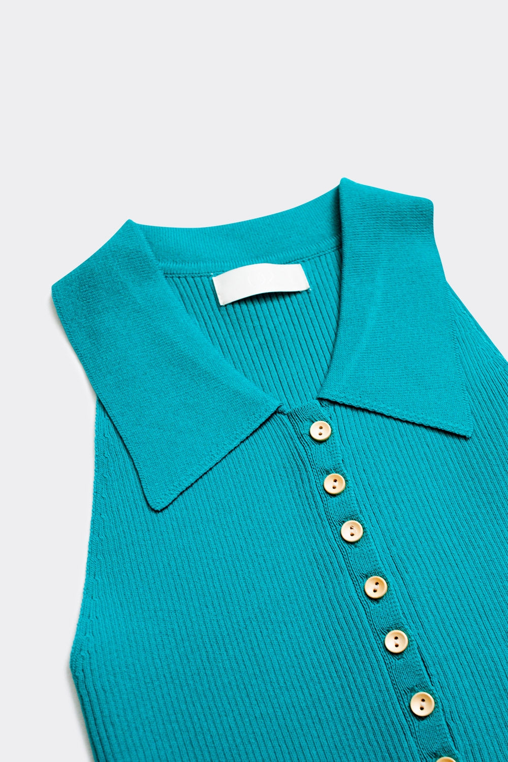 Ribbed knitted top with polo neck in turquoise