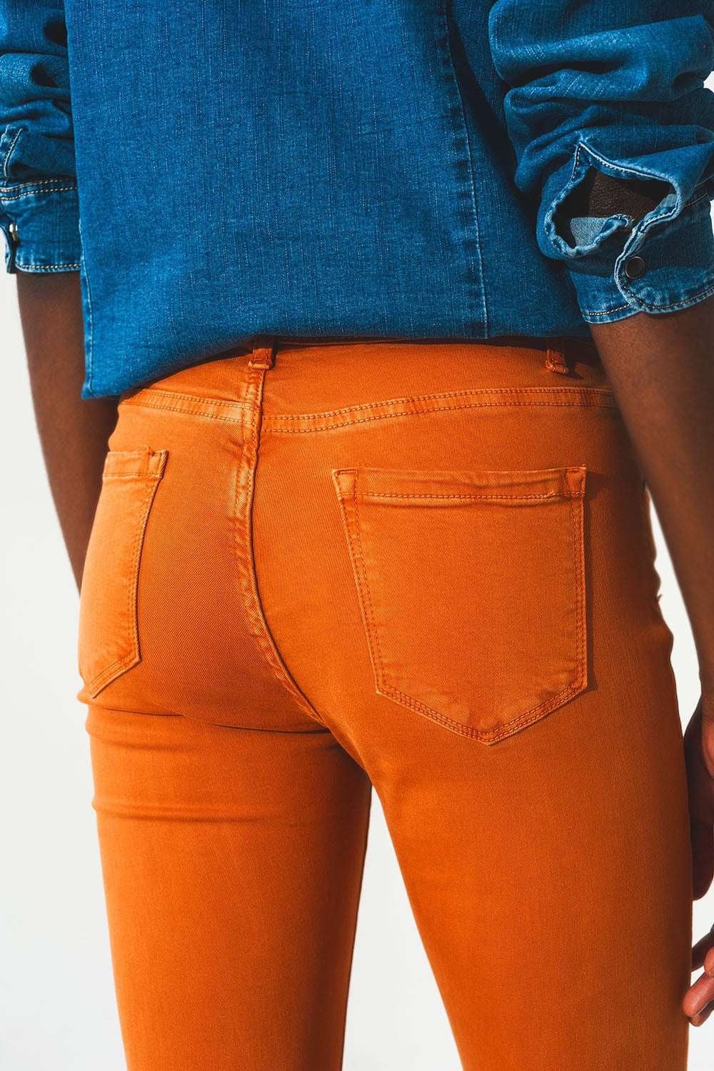 Flare jeans with raw hem edge in orange - Coloured Jeans