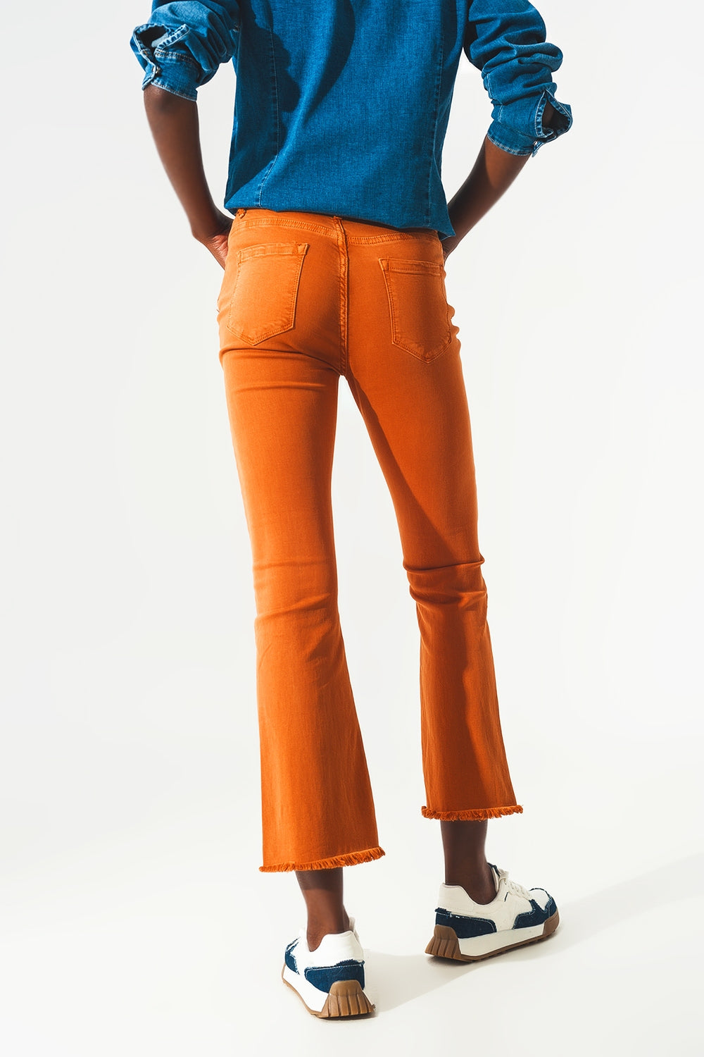Flare jeans with raw hem edge in orange - Coloured Jeans